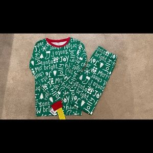 Brand New Carter’s Christmas Pajamas size 14.